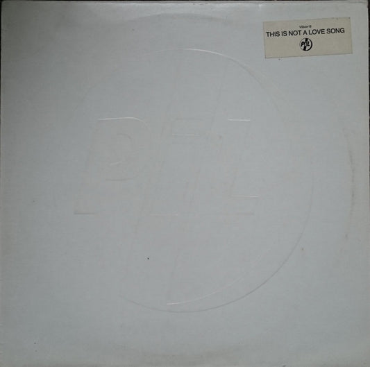PiL* : This Is Not A Love Song (12", Single, Emb)