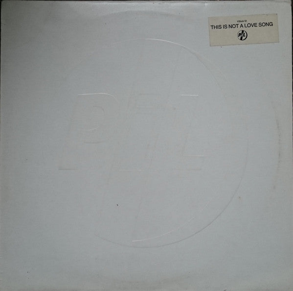 PiL* : This Is Not A Love Song (12", Single, Emb)