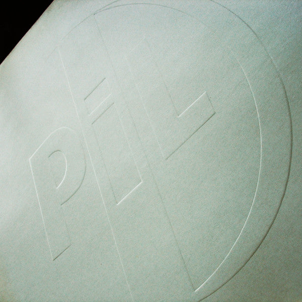 PiL* : This Is Not A Love Song (12", Single, Emb)