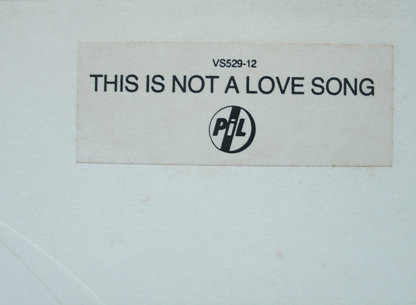 PiL* : This Is Not A Love Song (12", Single, Emb)