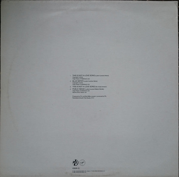 PiL* : This Is Not A Love Song (12", Single, Emb)