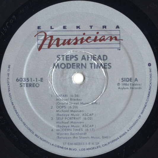 Steps Ahead − Michael Brecker, Warren Bernhardt, Peter Erskine, Eddie Gomez, Mike Mainieri : Modern Times (LP, Album)